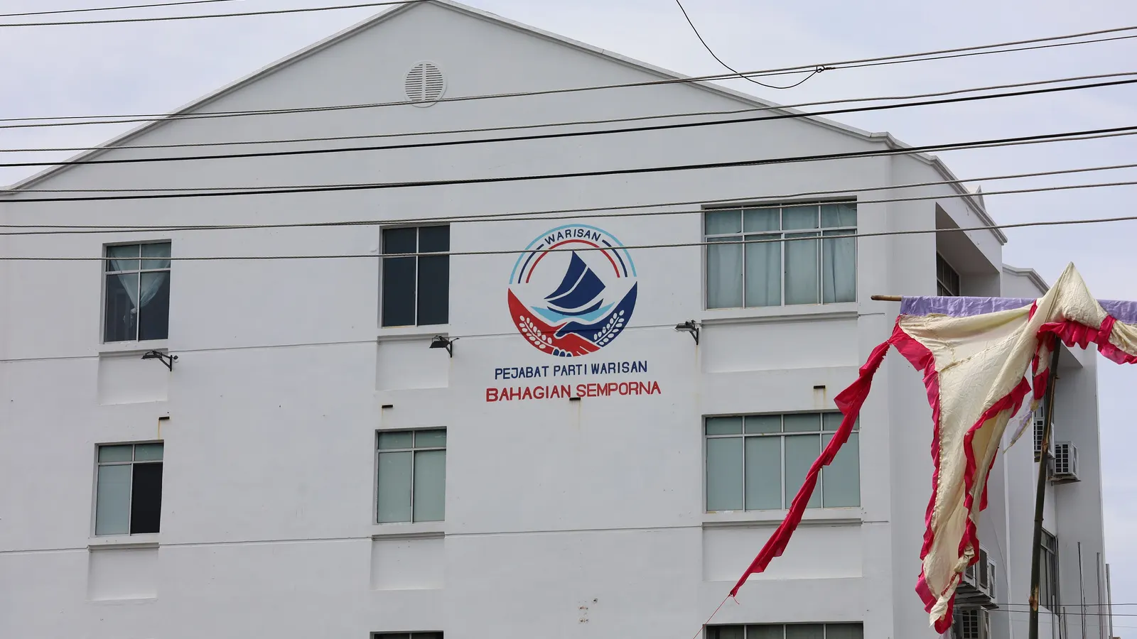 The Parti Warisan Semporna division office, with the Warisan logo on its white wall